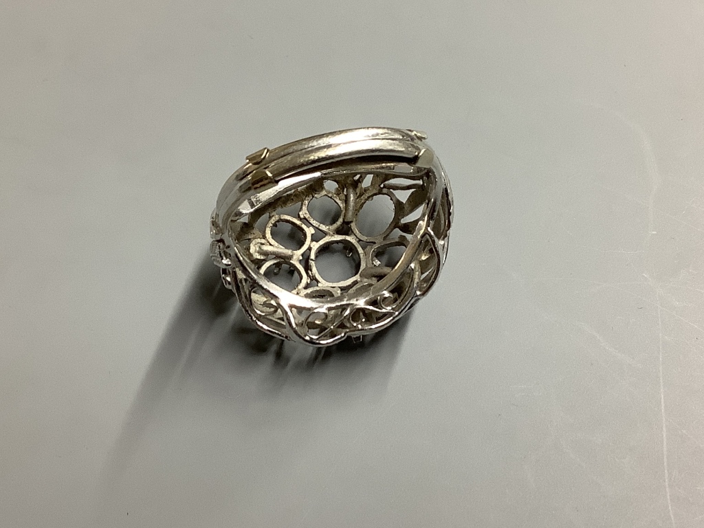 A Japanese 14ct white gold leaf design cluster ring setting (stones removed), 5.8 grams.